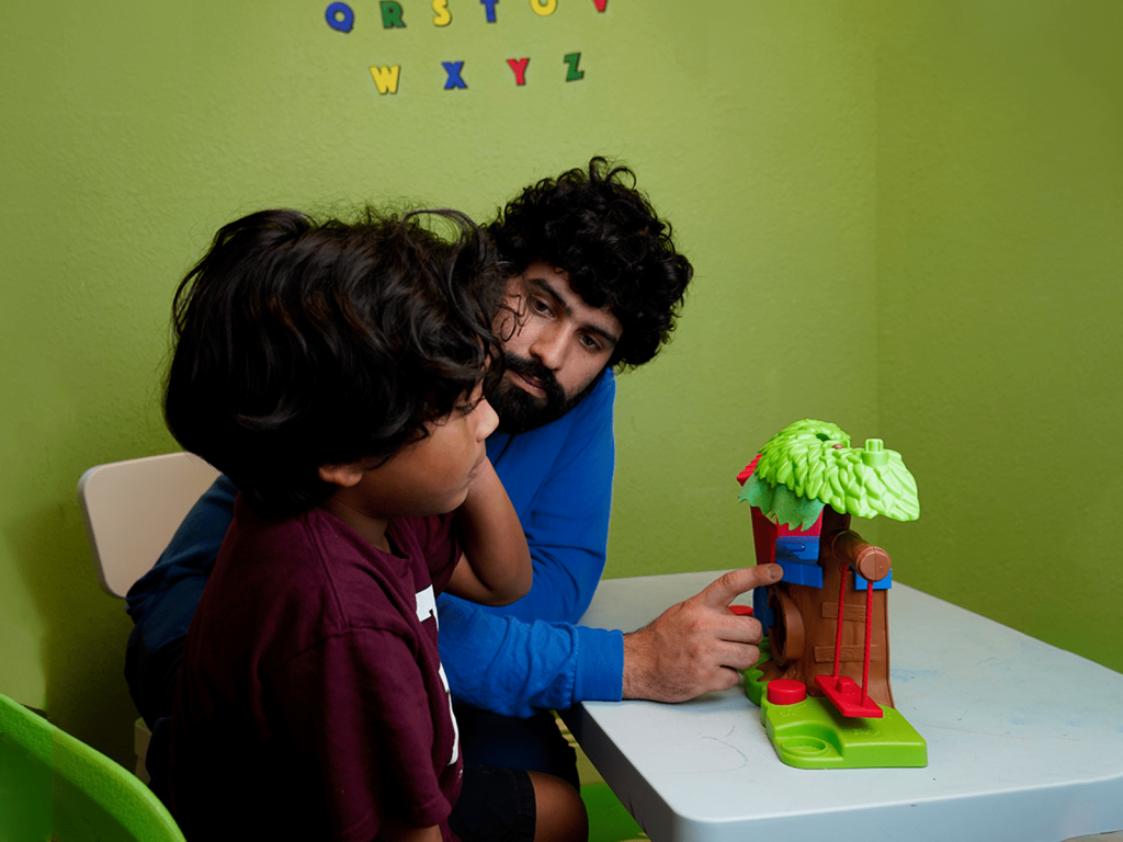 Trainer performing a Communication ABA skill Training